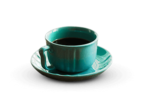 Cliente disfrutando café en Calle Sants